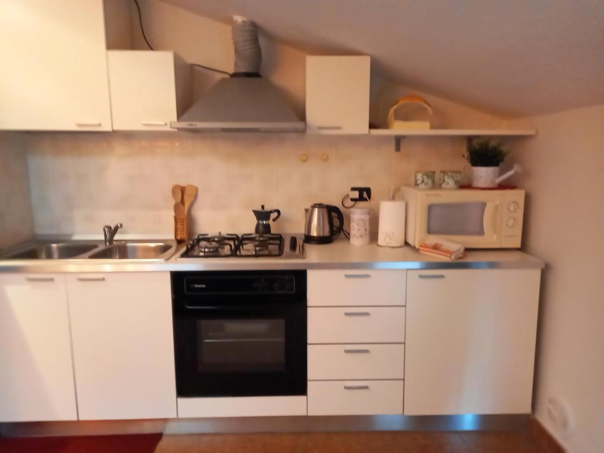 Dino Il Mansardino Apartman Ome Kültér fotó